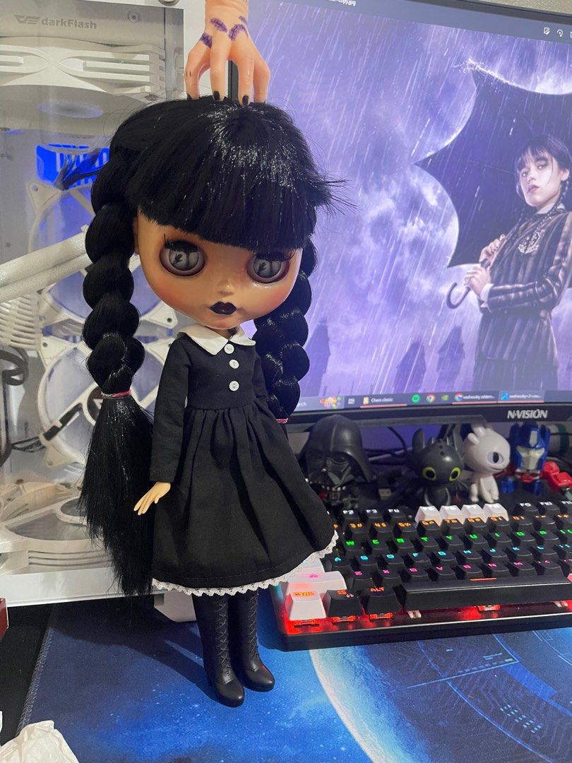 Custom Blythe doll handmade Wednesday Addams (Category: Figurines & Statues) located in Paranaque City. Submitted by cloud1312 (Listing ID 1249771207, Image 3). Description: Our creepy little Wednesday Addams is looking for a family to adopt her. Do you want to give it a new home? This girl will not let you down. Made to order One black dress One shoe 4 kinds of eyes Multiple hands with gestures Location: Paranaque .