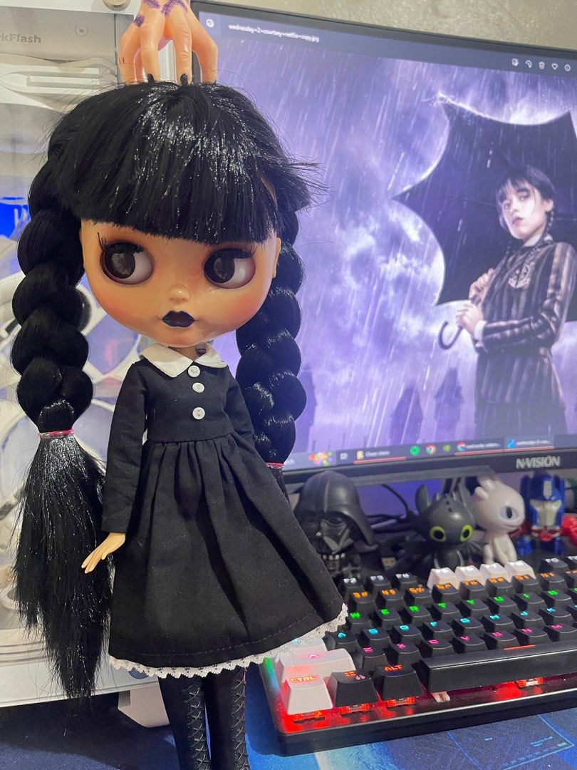 Custom Blythe doll handmade Wednesday Addams (Category: Figurines & Statues) located in Paranaque City. Submitted by cloud1312 (Listing ID 1249771207, Image 2). Description: Our creepy little Wednesday Addams is looking for a family to adopt her. Do you want to give it a new home? This girl will not let you down. Made to order One black dress One shoe 4 kinds of eyes Multiple hands with gestures Location: Paranaque .