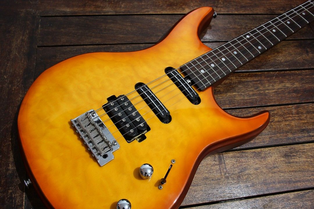 D&D DC1 (Amber Burst) electric guitar (Category: Musical Instruments) located in Quezon City. Submitted by gunslinger13 (Listing ID 1254072062, Image 2). Description: Up for grabs is a brand new D&D Custom Guitars DC1 in Amber Burst. Mahogany body with quilt top and matching headstock, mahogany neck, rosewood fingerboard, Wilkinson modern style tremolo system, locking tuners, 12" to 16" compound radius. Message me if you're interested!.