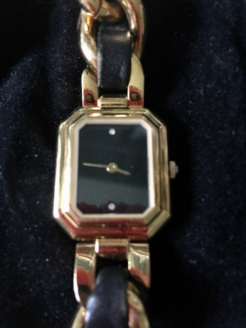 Gold designer watch on sale