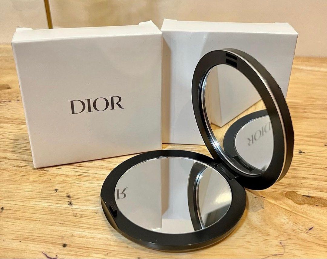 Dior Black Compact Mirror (Category: Luxury Accessories) located in Manila. Submitted by jennystuff (Listing ID 1254037606, Image 2). Description: Brand new Dior Compact Mirror. Still with box. Got it as a gift. Not sure for the authenticity. But looks so pretty..
