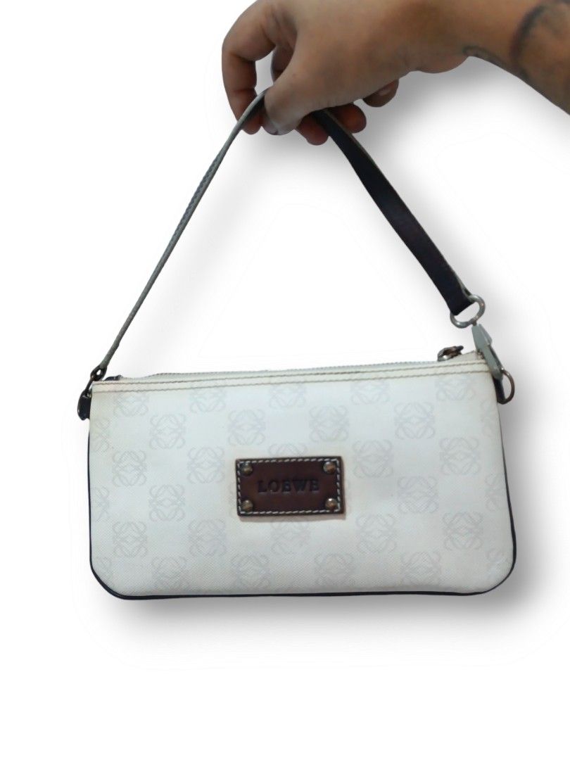 LOEWE BAGUET (Category: Luxury Bags & Wallets) located in Malabon City. Submitted by mistej_restoration (Listing ID 1254071370, Image 1). Description: 22x12cm Handbag / wrist wallet.