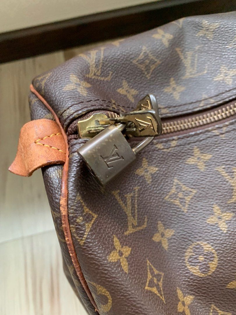 Louis Vuitton Keepall 50 Monogram Canvas Travel Bag Red