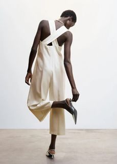 MANGO Cream eggshell wrap criss-cross back cropped short v-neck line flowy jumpsuit (from Php3,295)