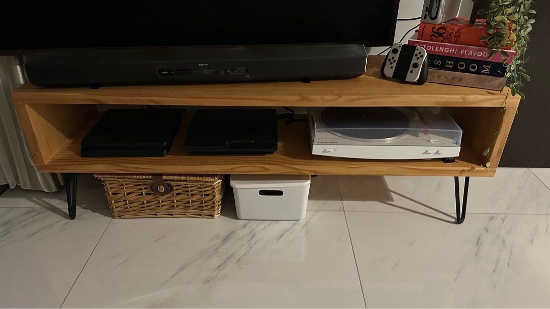 minimalist_tv_console_in_natur_1694315552_06285a50_progressive.jpg
