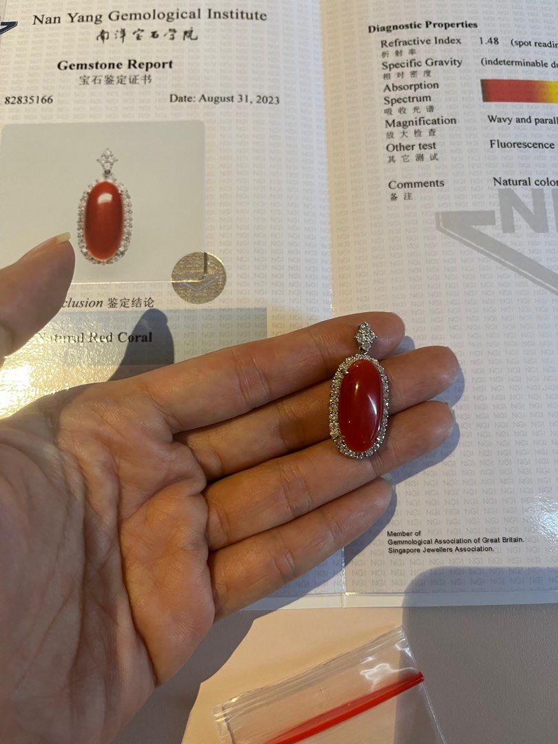 Red coral top and pearl ring
