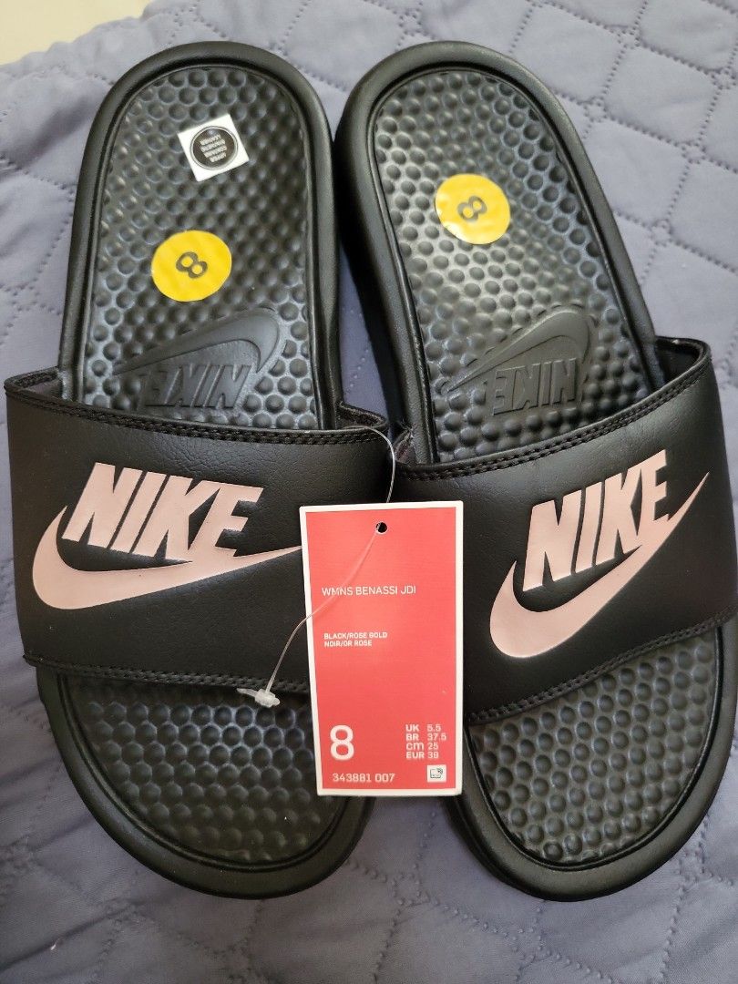 Black and rose hotsell gold nike sliders