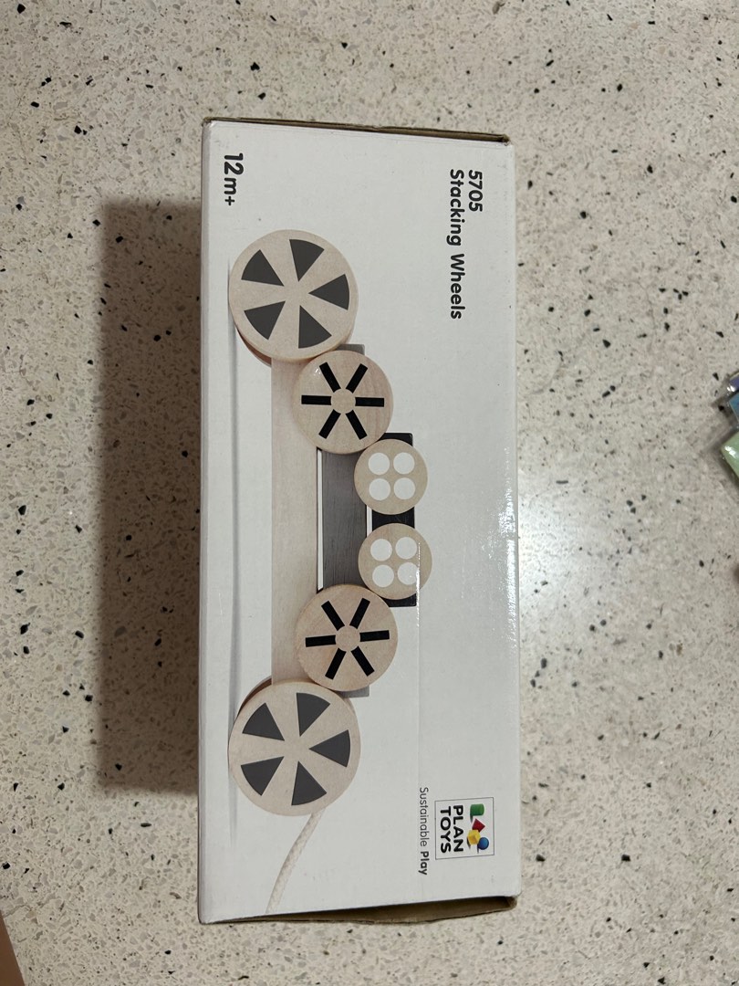 Plan toys stacking wheels online