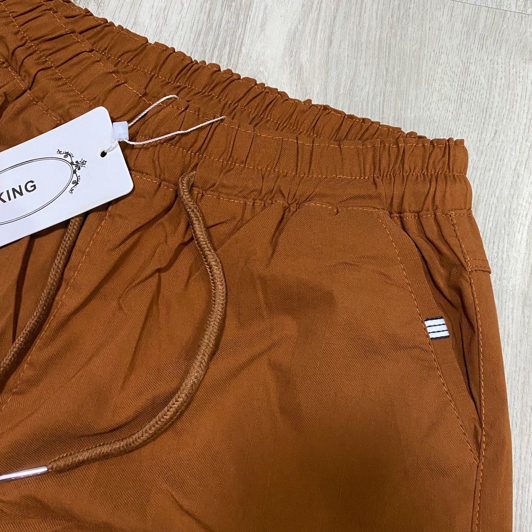 Rust Trousers (Best fit for size 32-36) (Category: Other Bottoms) located in Antipolo. Submitted by acecapsuleph (Listing ID 1254046756, Image 3). Description: ▫️Orig Price: 280 ▫️RFS: Nadoble nung seller yung color, di ko na mareturn 😭 ▫️Very HQ yung tela! Di mainit, masarap isuot since hindi pa skinny masyado yung cut niya. Hindi ka rin magwoworry dito pagbusog ka kasi garterized siya. Kaya bilhin niyo na Gow!.