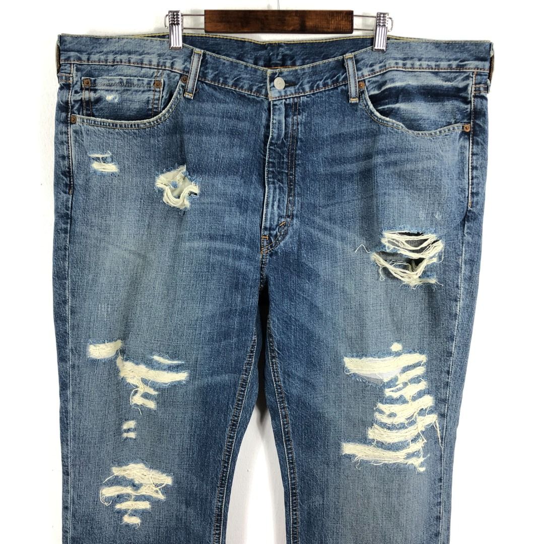 Levis 541 ripped jeans hot sale