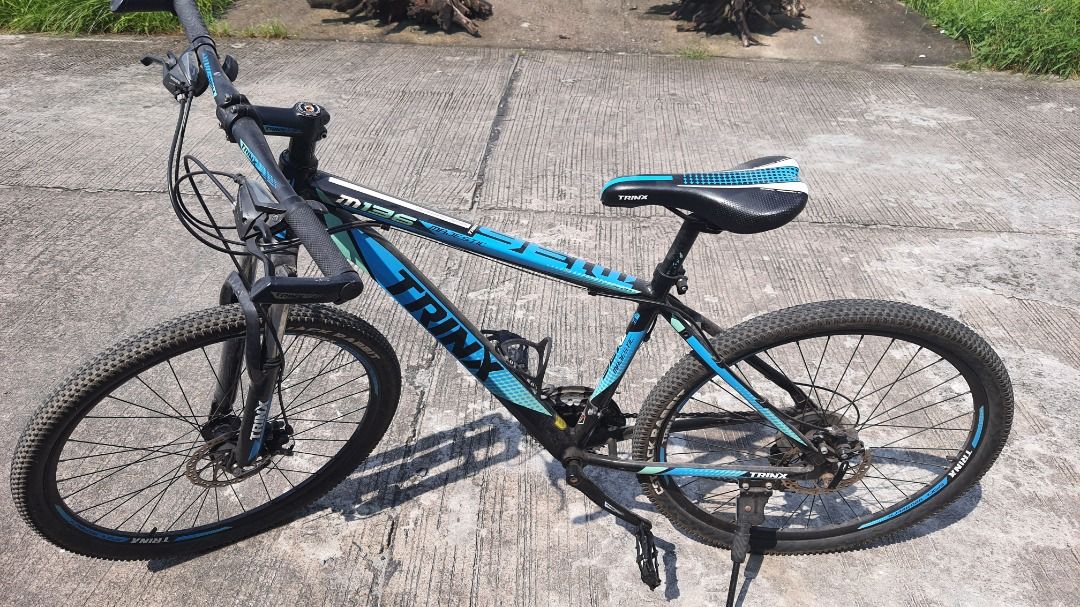 trinx mountain bike blue