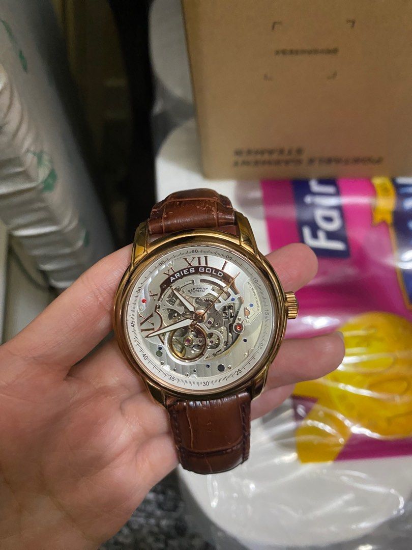 Aries gold automatic watch hotsell