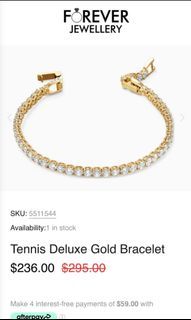AUTHENTIC Swarovski tennis deluxe gold bracelet