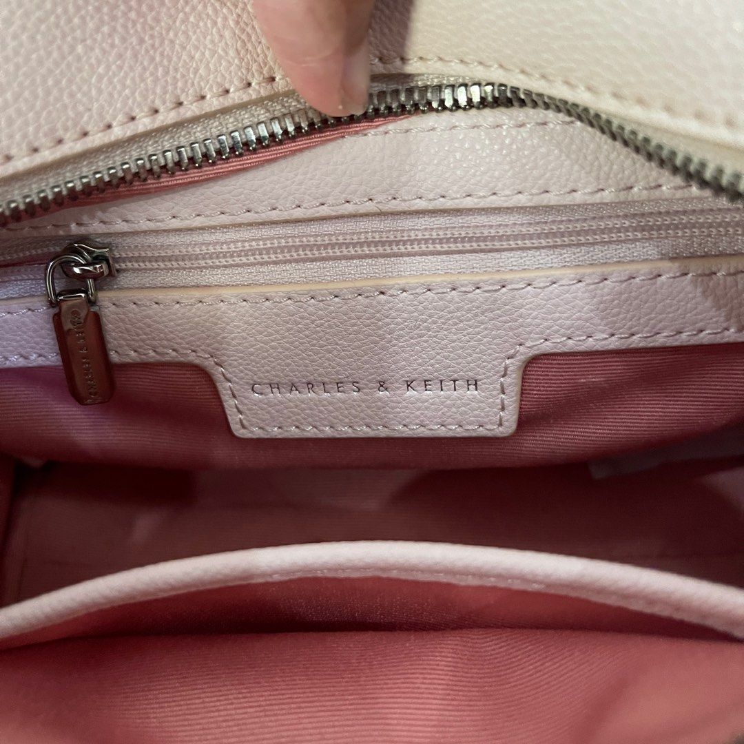 Authentic Charles & Keith Light Pink (Category: Cross-body Bags) located in Manila. Submitted by wellnessessentials (Listing ID 1254130613, Image 2). Description: Original Charles & Keith Direct Message 💌 Courier 🚚 Jnt.