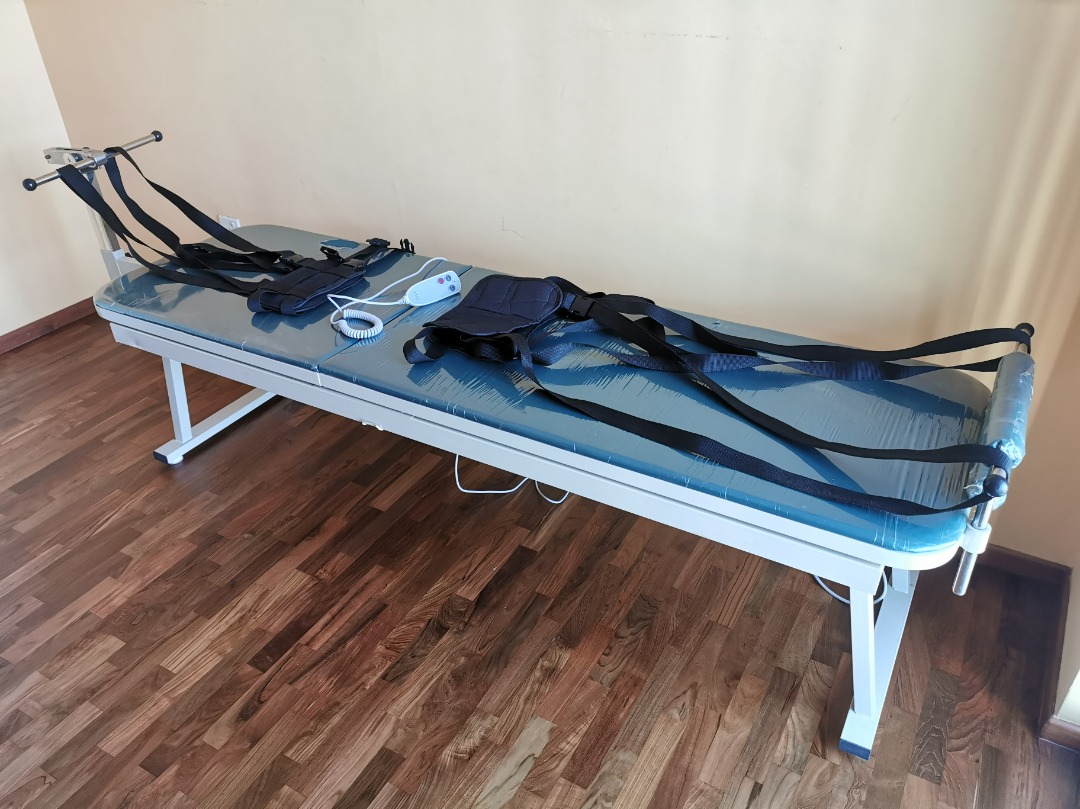 Cheap Chiropractic Traction Table to relieve Lumbar Spine