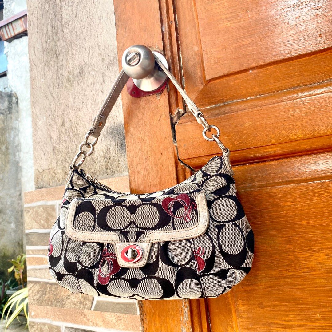 Coach Rare Signature Bag (Category: Luxury Bags & Wallets) located in Batangas. Submitted by avery.declutter (Listing ID 1254140288, Image 3). Description: DETAILS: CODE: L1321-F18756 CONDITION: 9.5/10 COLOR RATE: 9/10 • Needs cleaning (Washable) • Overall condition is good • No rubs, scratches, and holes..