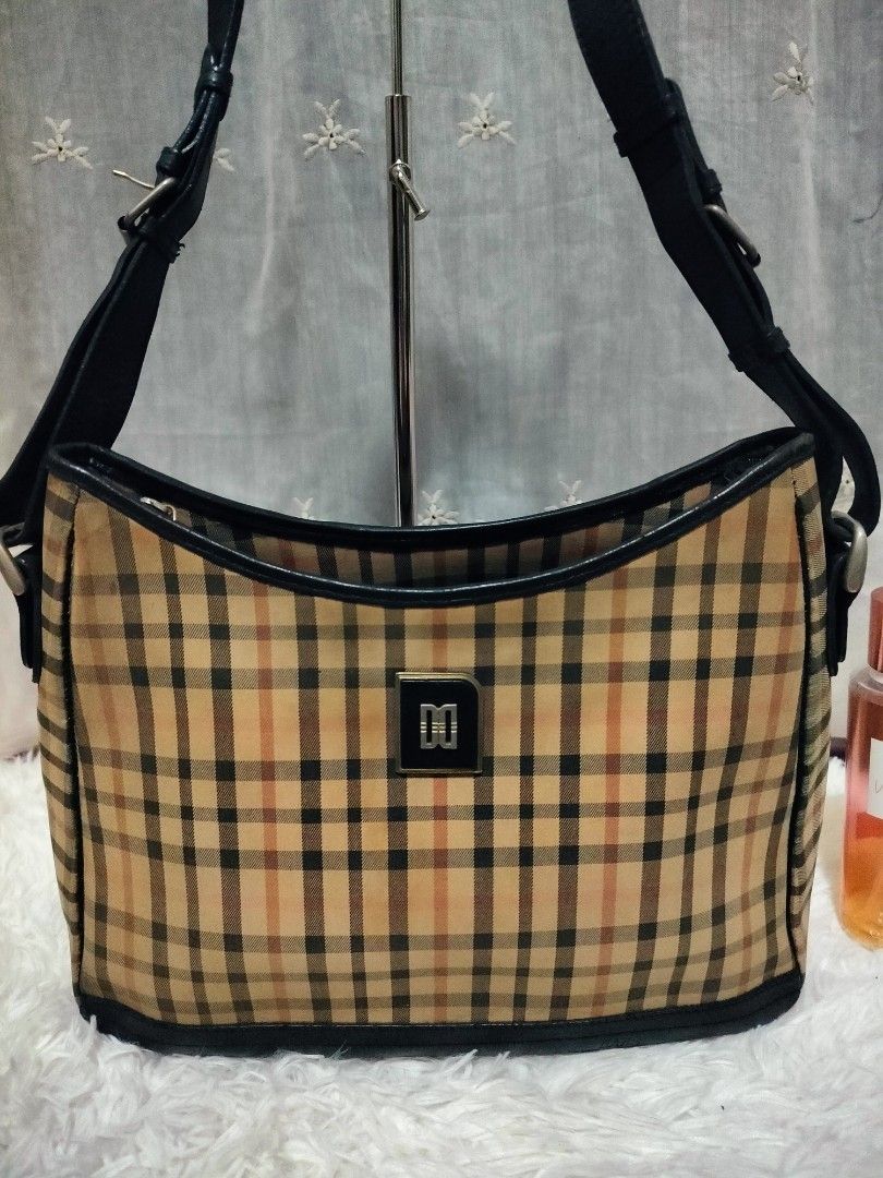Daks sling bag price deals