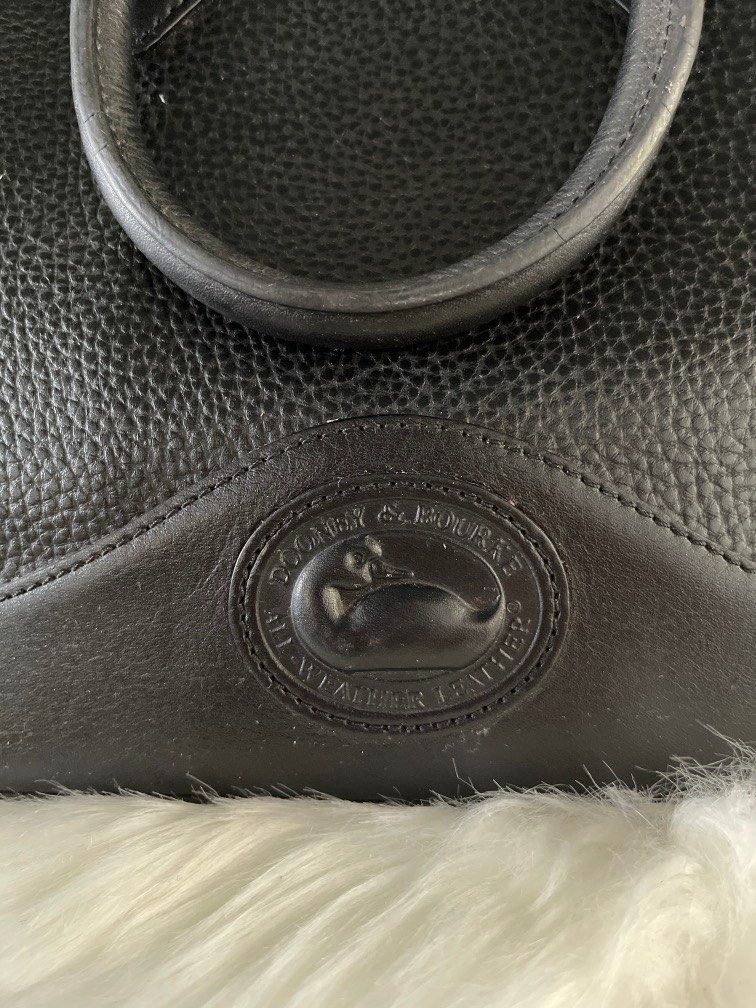 Dooney & Bourke - Vintage Bag (Category: Luxury Bags & Wallets) located in Batangas. Submitted by caryllpascua (Listing ID 1254082721, Image 2). Description: Note: These are PERSONAL PRELOVED items. 📍BUY AT YOUR OWN RISK. 📍Kindly have self authentication for branded items. 📍Prices are exclusive of the shipping fee. 📍Delivery via Lalamove or LBC is available too. 📍Gcash / Bank Transfer available - Payment 1st policy. 📍ShopE3 checkout link av