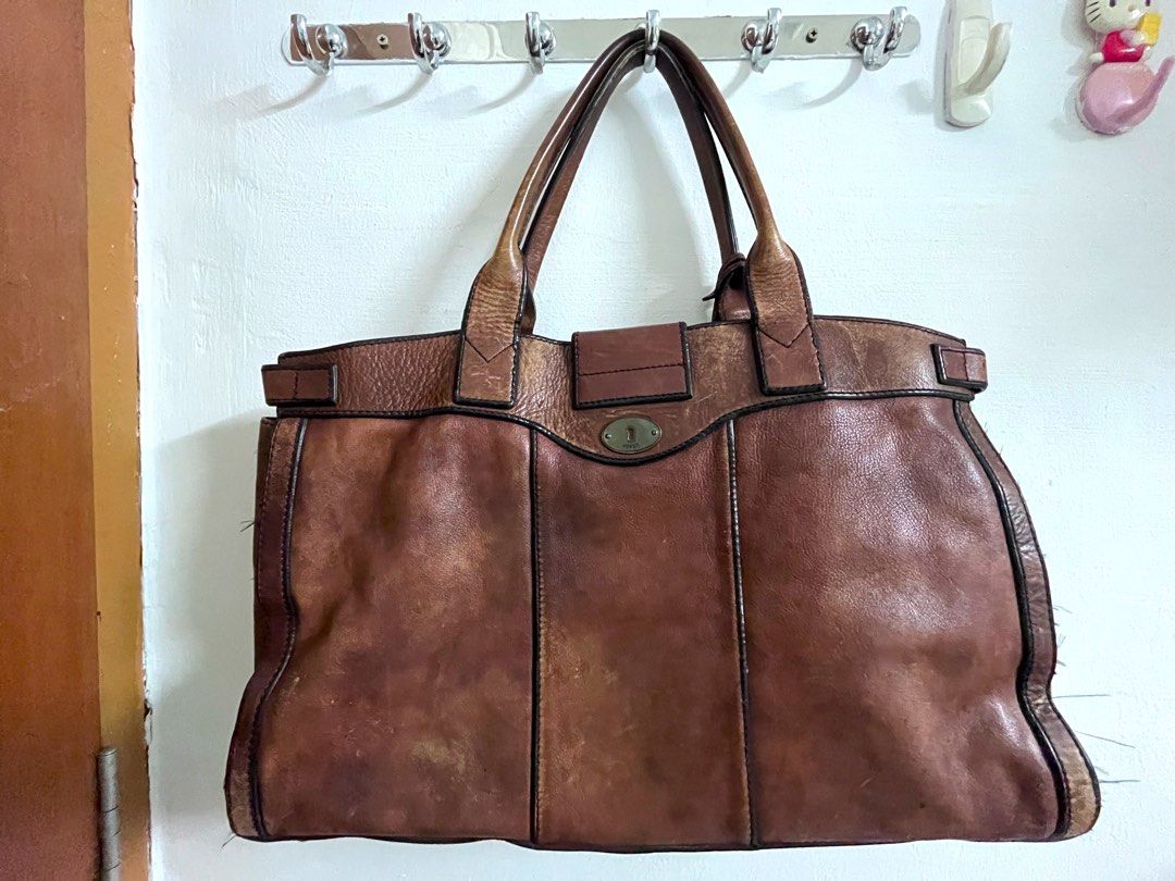 Fossil weekender deals bag