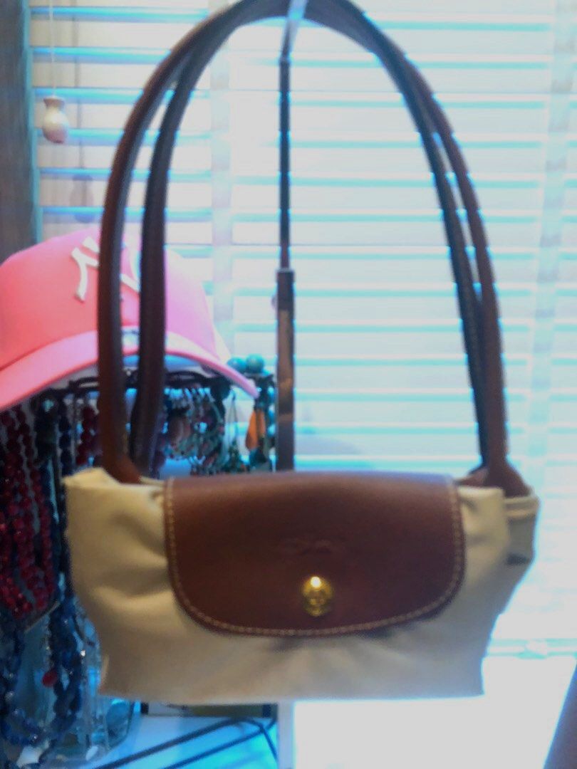 Plier store sac longchamp