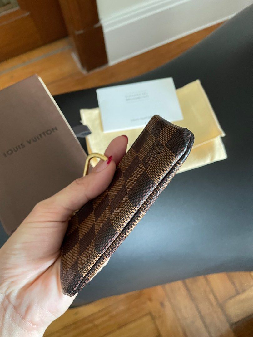 Louis Vuitton damier ebene coin purse (Category: Luxury Bags & Wallets) located in Makati City. Submitted by morticiawick (Listing ID 1254128168, Image 3). Description: I rate this item rarely used. Comes with its original inclusions (box, dust bag, papers) .
