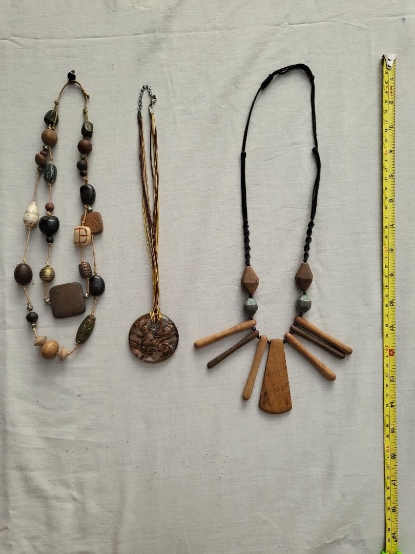 Murano and wood necklace (Category: Necklaces) located in Makati City. Submitted by m.f.c. (Listing ID 1254175340, Image 2). Description: Selling as a lot: 1. wood necklace 2. murano necklace from Spain 3. wood tibal design necklace Payment BPI BDO GCash. SF c/o buyer..