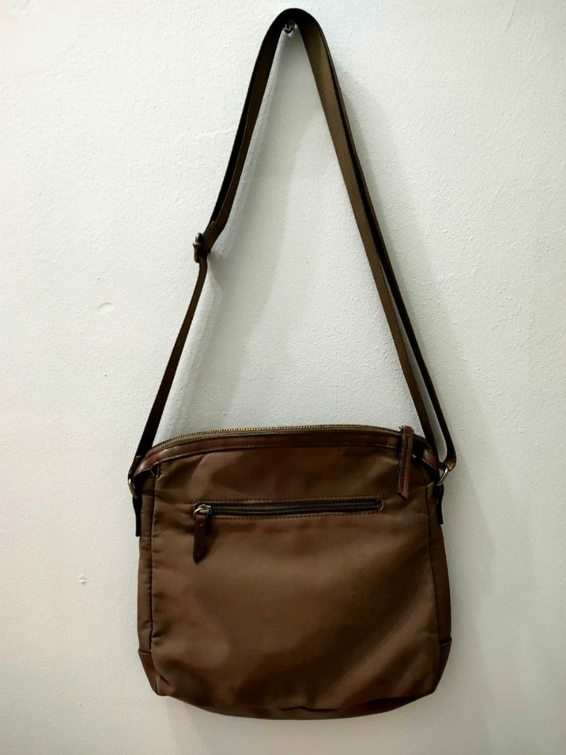 Roots sling bag canada sales