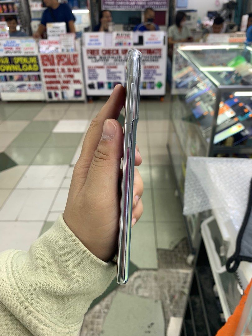 SAMSUNG S21 plus 5G DUALSIM OPENLINE NTC APPROVED (Category: Samsung) located in Pasig City. Submitted by fairgadgetshop (Listing ID 1254166467, Image 3). Description: OPEN FOR SALE, SWAPPING OR TRADE-IN WE ARE BUYING PRELOVED OR BRANDNEW (EVEN BY BULK) ALL KINDS OF GADGET LAPTOP, IPHONES, ANDROID SMARTPHONES, APPLE WATCH, IPAD ETC. MESSAGE US FOR MORE INFO.✨🧡 (RFS: BUY & SELL) Selling Preloved: SAMSUNG S21 PLUS 5G 8/256 OPENLINE DUALSIM NTC APP