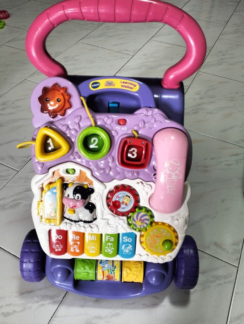 V Tech Learning Walker (Category: Educational & Learning Toys) located in Singapore. Submitted by never1900 (Listing ID 1254089369, Image 1). Description: Products Product Details Best for ages: 9 to 36 months From baby steps to big steps the Sit-to-Stand Learning Walker™ by VTech® helps your child develop from a crawler to a walker through adaptive technology. With a barnyard of playful friends to cheer them on, your little one will have endless