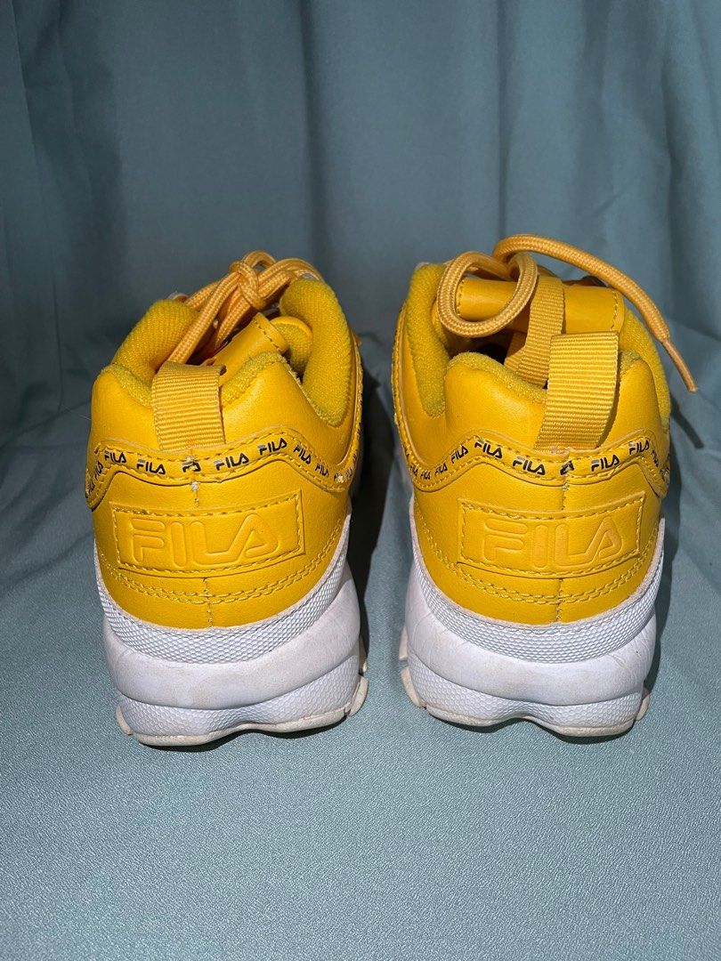 Fila yellow trainers Fesyen Wanita Sepatu di Carousell