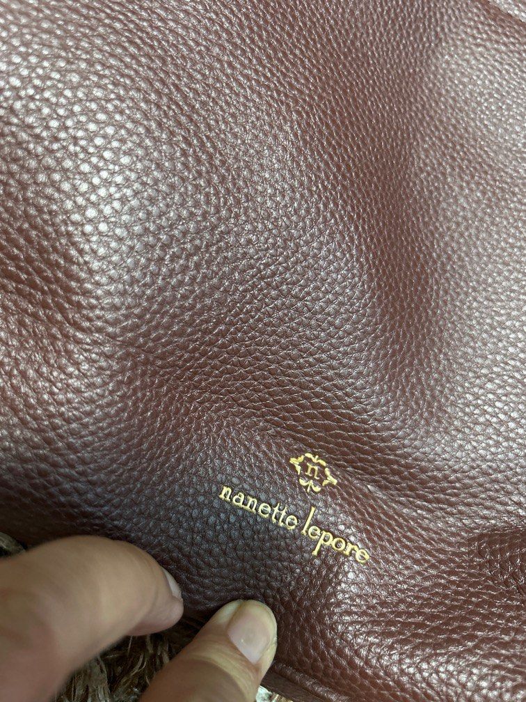 Nannette Lepore original shoulder bag (Category: Shoulder Bags) located in Silang. Submitted by sari2bilina (Listing ID 1254347412, Image 3). Description: see flaws on photos.