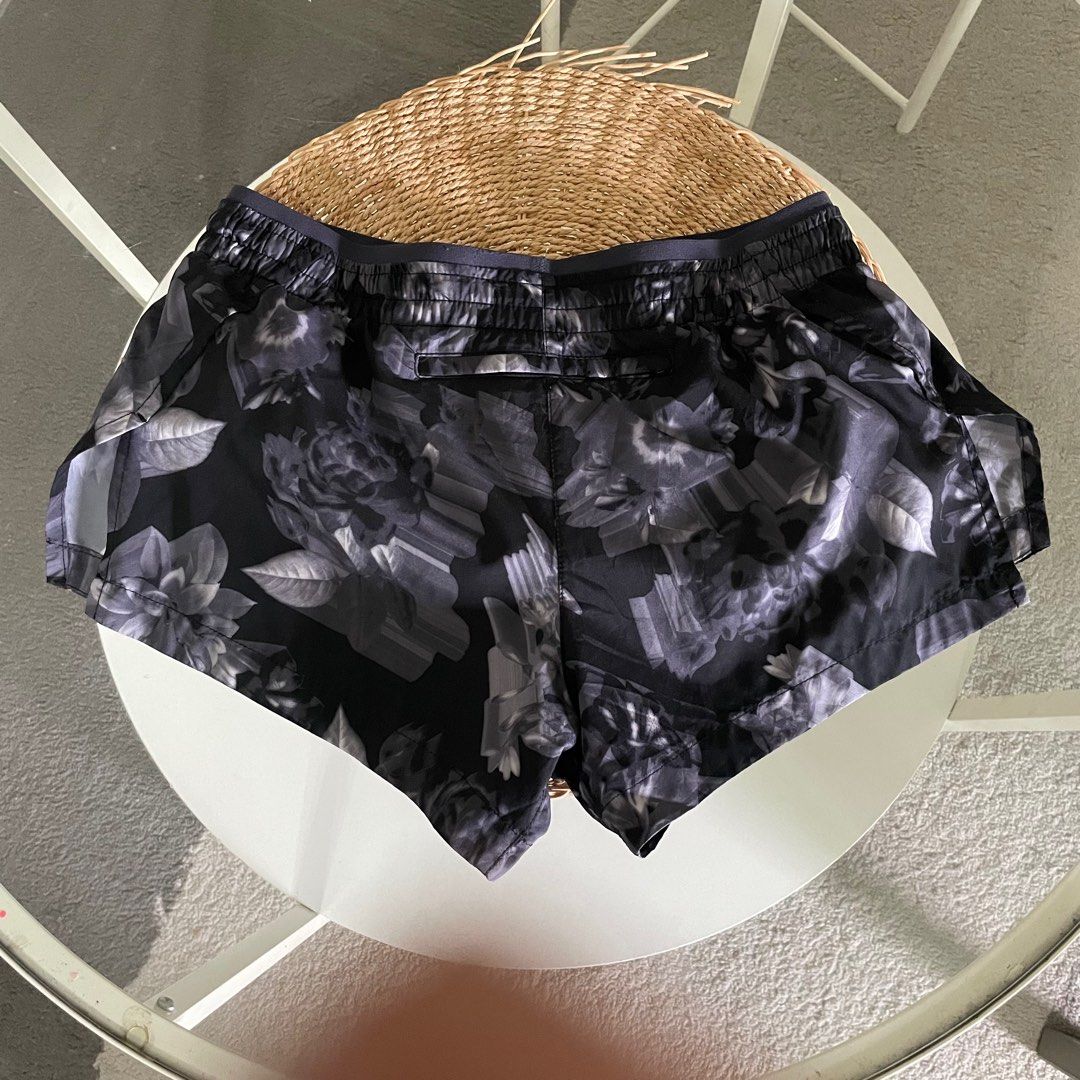 Nike floral best sale running shorts