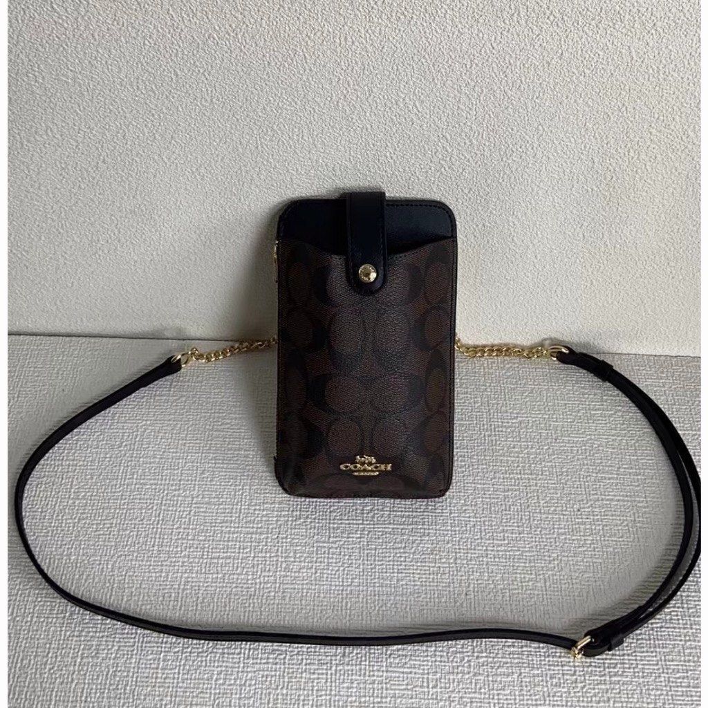 Rachel phone crossbody in sales signature canvas with butterfly print