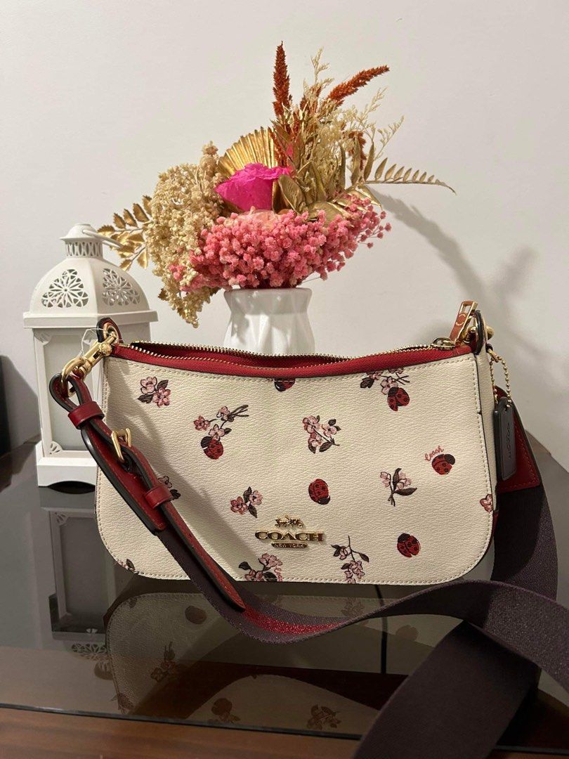 Sutton crossbody best sale with floral print