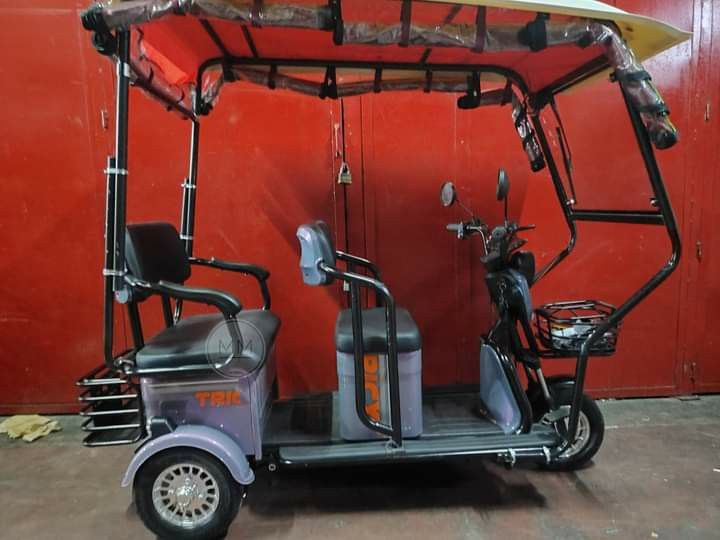 Super fashion ebike (Category: Bicycles) located in Manila. Submitted by minidivisoria (Listing ID 1254295446, Image 1). Description: NEW ARRIVAL Super FASHION ebike 3 wheels,2 rows with ROOF! INCLUSIONS: Unit with complete accessories Side mirror with trapal automatic wiper Colors avail Red Black in Glossy Violet Gray Blue Specs. With wiper With panel With anti theft alarm 3 seater Front & Back Basket Battery Lead Acid 48v 20AH 600Watts 40-50Km 