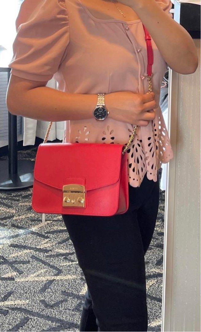 BNWT Furla Metropolis Bag Red (Category: Luxury Bags & Wallets) located in Binan City. Submitted by your_shopping_buddy (Listing ID 1254489747, Image 2). Description: Brand New with Tag and Dust Bag 100% Authentic from Japan Pwede nyo i pa legit check yung item and yung shop namin sa efbi Pickup Canlalay Biñan Laguna Lalamove Biñan and Makati.