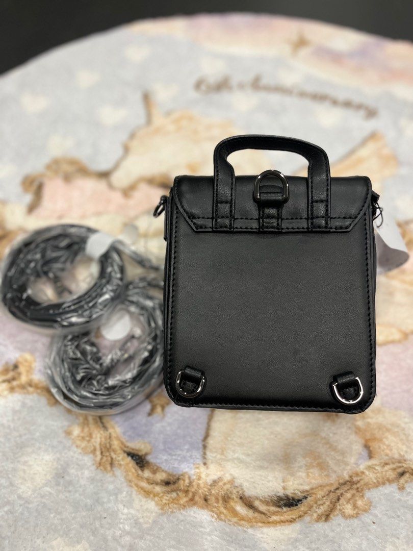 Jessie Jane black leather mini backpack, Women's Fashion, Bags - Main Image