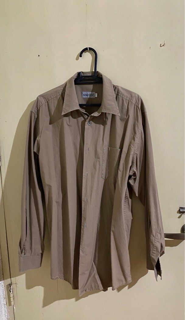 Mens Long Sleeve Polo (Category: Formal Shirts) located in Bacoor. Submitted by patrickluwis (Listing ID 1249152984, Image 1). Description: Complete buttons. Lightly used. In good condition. No issue. Can fit M-XL frame. Payment thru BDO, BPI, Metrobank, Gcash or Shopeepay + shipping fee c/o buyer for delivery thru J&T.