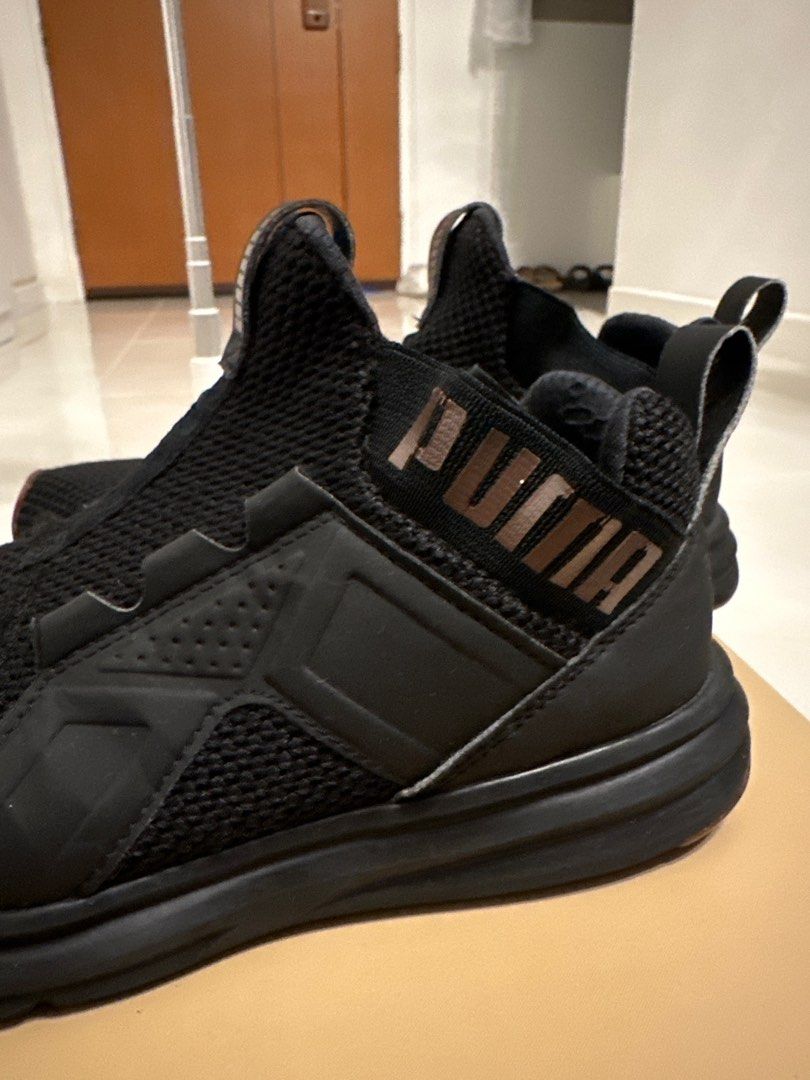 Puma shoes discount gold and black