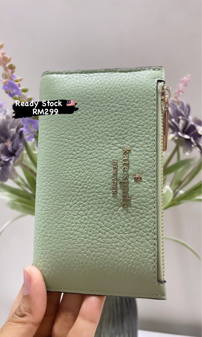 Kate spade sylvia small slim bifold wallet hotsell