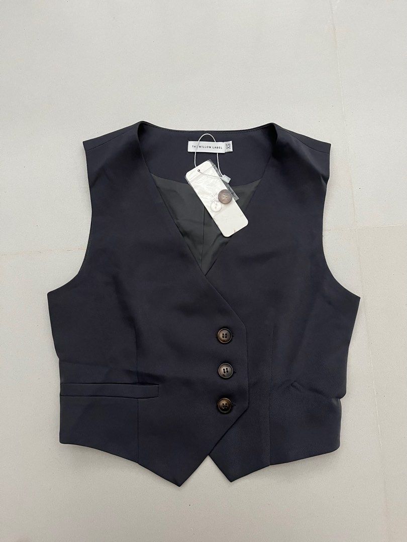 Waistcoat side clearance button