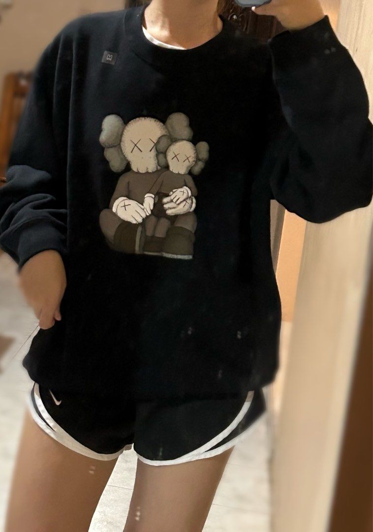 Uniqlo kaws black sweatshirt in medium Women s Fashion Coats Jackets and Outerwear on Carousell