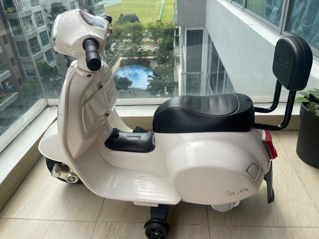 childs electric vespa scooter