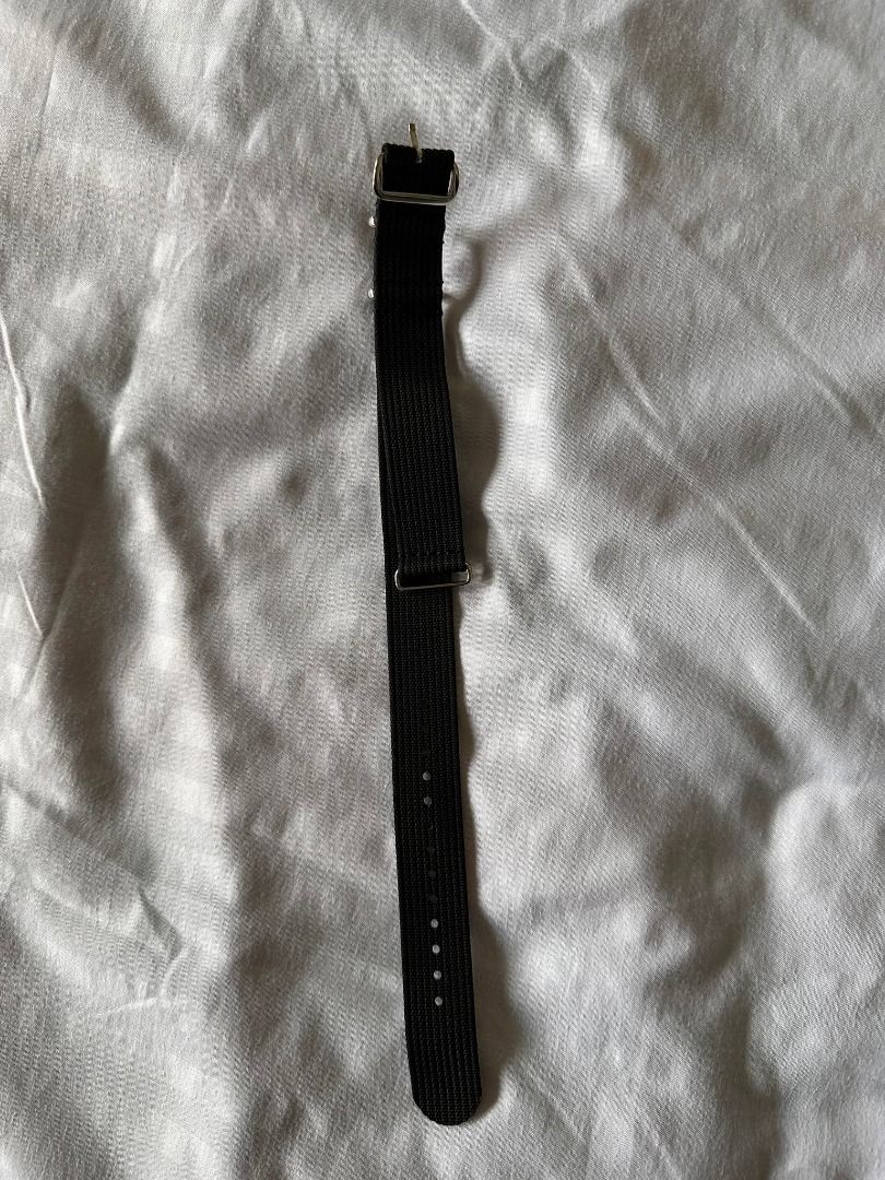 20mm Black NATO Nylon Watch Strap (Category: Luxury Watches) located in Muntinlupa City. Submitted by alabang__thrift (Listing ID 1254680031, Image 2). Description: 20mm Black NATO Nylon Watch Strap Mine was used for Omega x Swatch Collab Alabang area Will not provide anymore pictures .