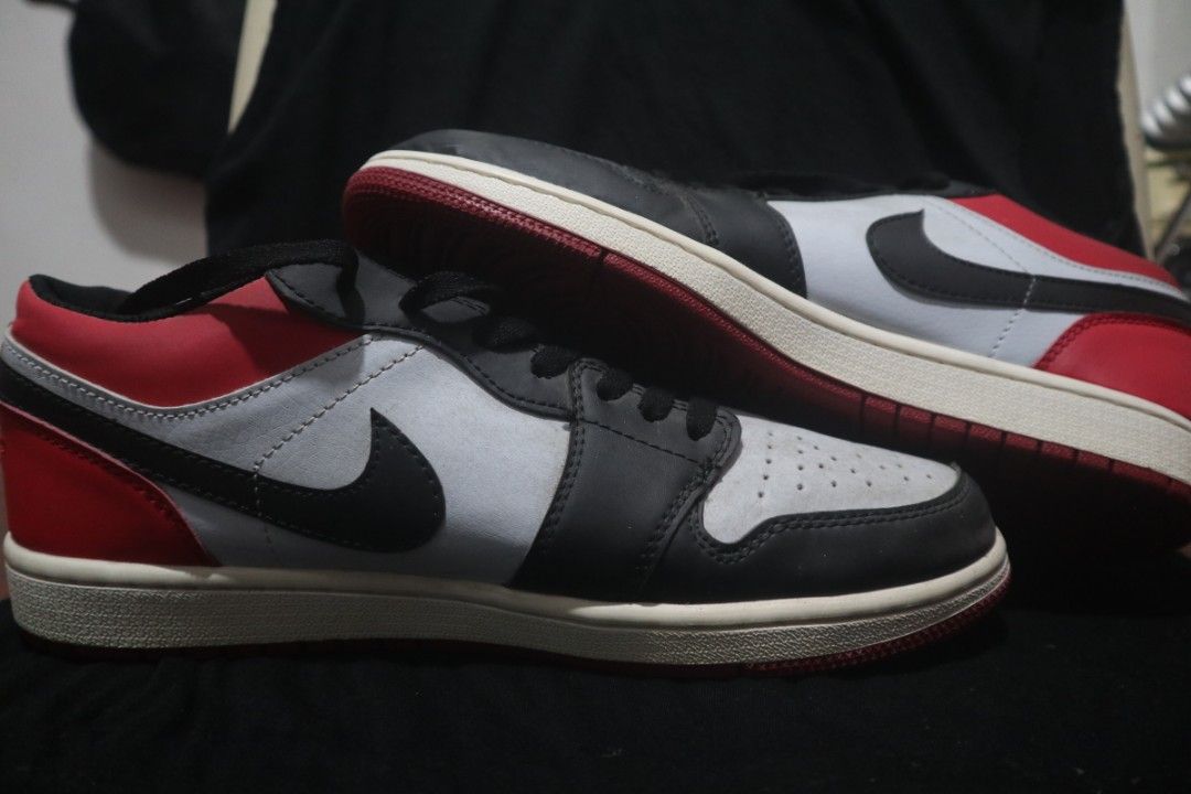 low top jordans red and black