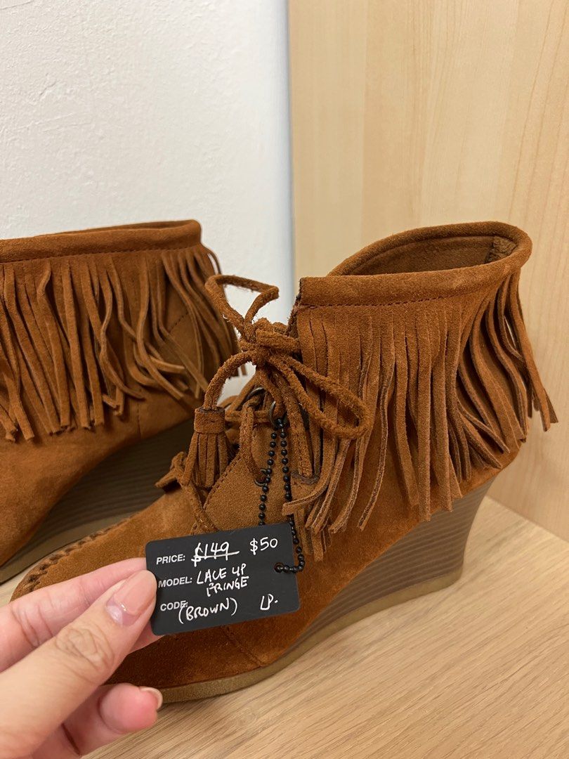 Minnetonka outlet wedge boots