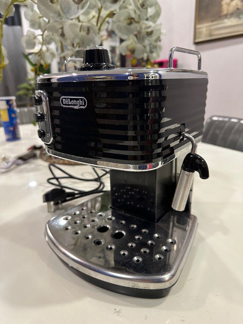 Delonghi scultura coffee deals machine review