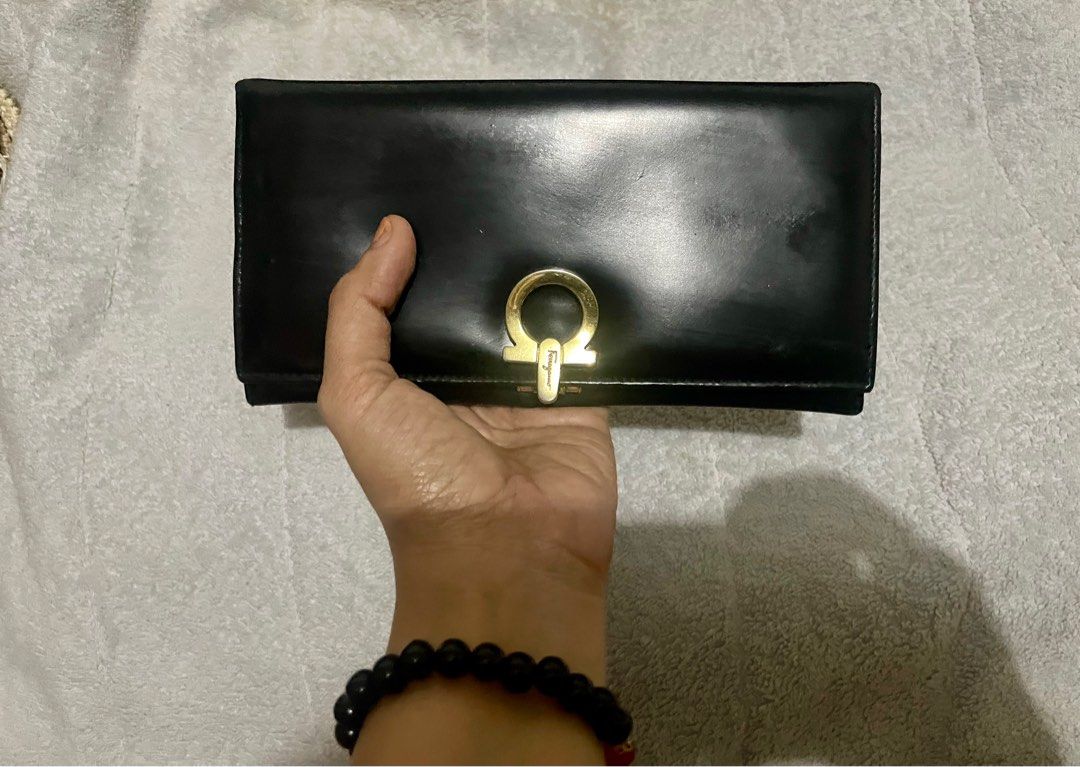 FERRAGAMO long patent leather wallet (Category: Luxury Bags & Wallets) located in San Pablo. Submitted by prelovedbymistyblue (Listing ID 1254759195, Image 2). Description: Super nice Salvatorre Ferragamo patent leather long wallet. With minimal signs of use on the hardware and some scratches/ rubs on the the inner patent leather. Selling low for 2200. .