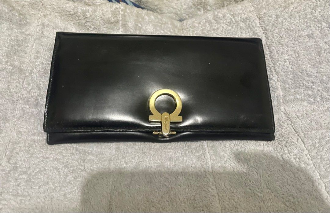 FERRAGAMO long patent leather wallet (Category: Luxury Bags & Wallets) located in San Pablo. Submitted by prelovedbymistyblue (Listing ID 1254759195, Image 1). Description: Super nice Salvatorre Ferragamo patent leather long wallet. With minimal signs of use on the hardware and some scratches/ rubs on the the inner patent leather. Selling low for 2200. .