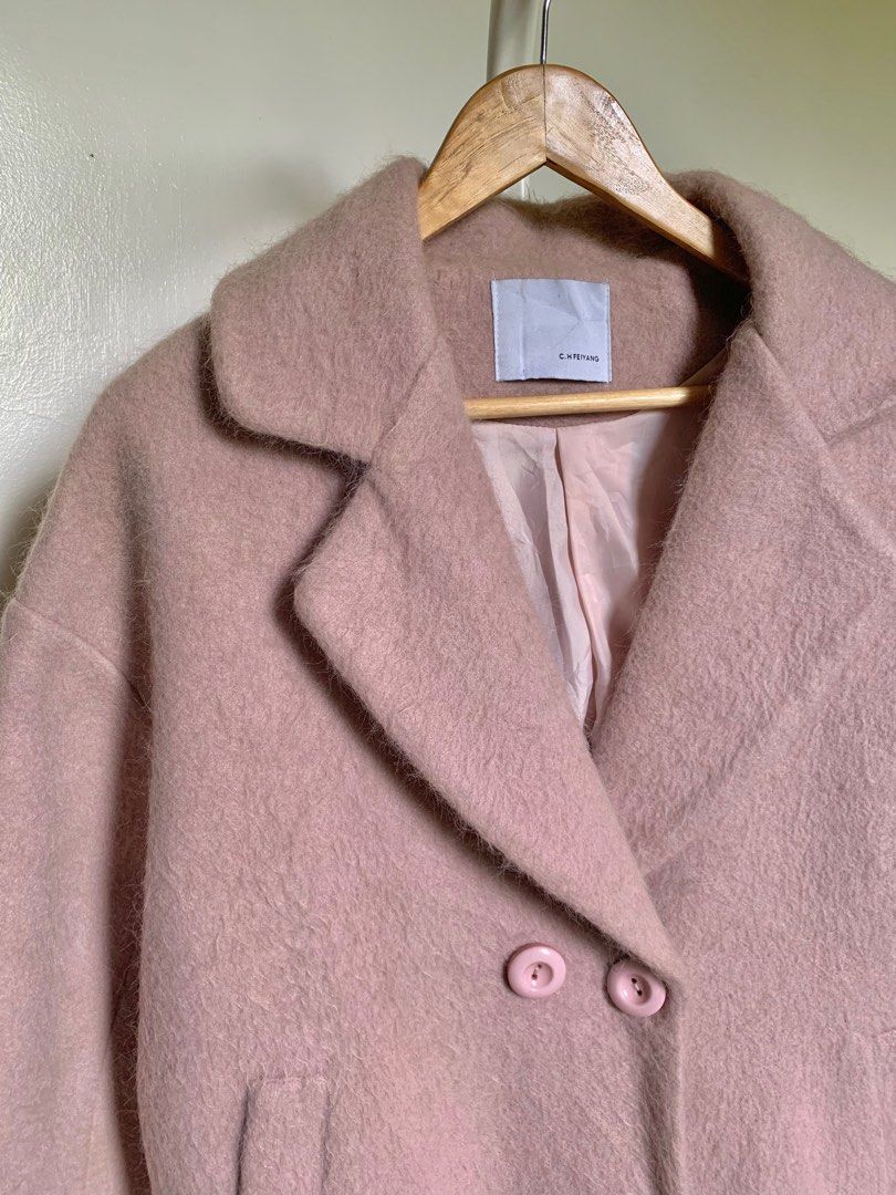 Light Mauve Winter Wool Coat (Category: Coats, Jackets and Outerwear) located in Caloocan City. Submitted by hellodeco (Listing ID 1254658461, Image 2). Description: Light Mauve Winter Wool Coat FAVEEE! So hard to let go—if only the length of sleeves was a bit longer. The color is 🤌🏻 Size: S - L Needs washing. Has unnoticeable yellow marks but will be removed when washed. RFS: Decluttering. Need space for the new ones..